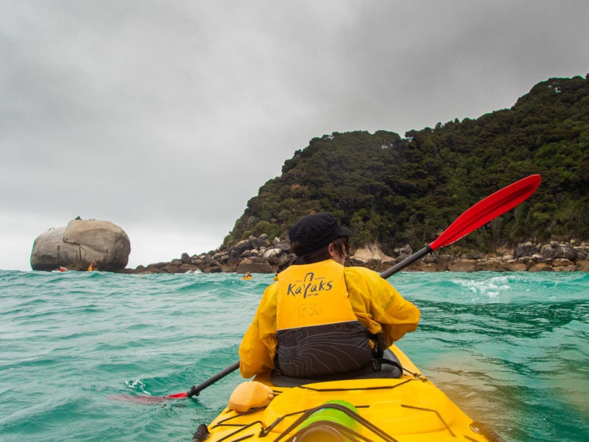 kayaking in abel tasman national park by Cottage Loaf Rock in Brereton Cove